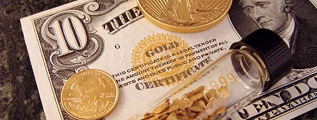 الذهب يهبط عن أعلى مستوياته على الاطلاق بفعل قوة الدولار الأمريكي